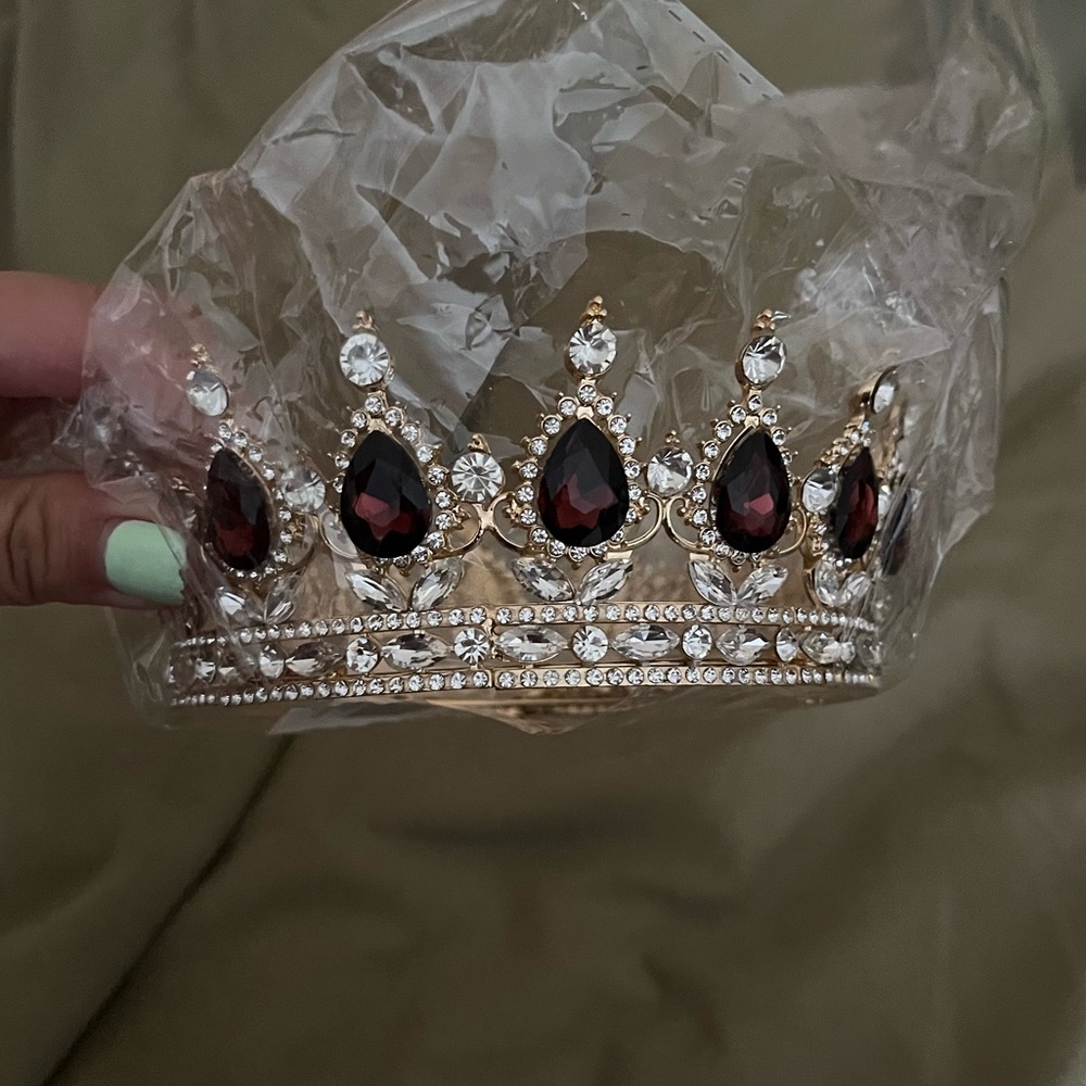 Gold and burgundy costume jeweled crown